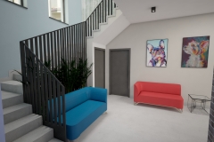 008.-klinika-weterynaryjna-klatka-schodowa-czerwony-niebieski-beton-czarny-lamele