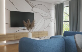 Nowoczesny salon z kuchnią – projekt wnętrza z niebieską sofą, drewnianą zabudową, półwyspem kuchennym i jasnymi dodatkami.