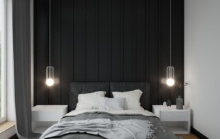 Nowoczesna sypialnia z czarną ścianą za łóżkiem, tapicerowanym łóżkiem, wiszącymi lampami nocnymi i minimalistyczną aranżacją w czarno-białej kolorystyce.