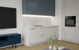 Mały salon z aneksem kuchennym z granatowymi i białymi frontami, drewnianą podłogą, szafką RTV i minimalistycznym oświetleniem.